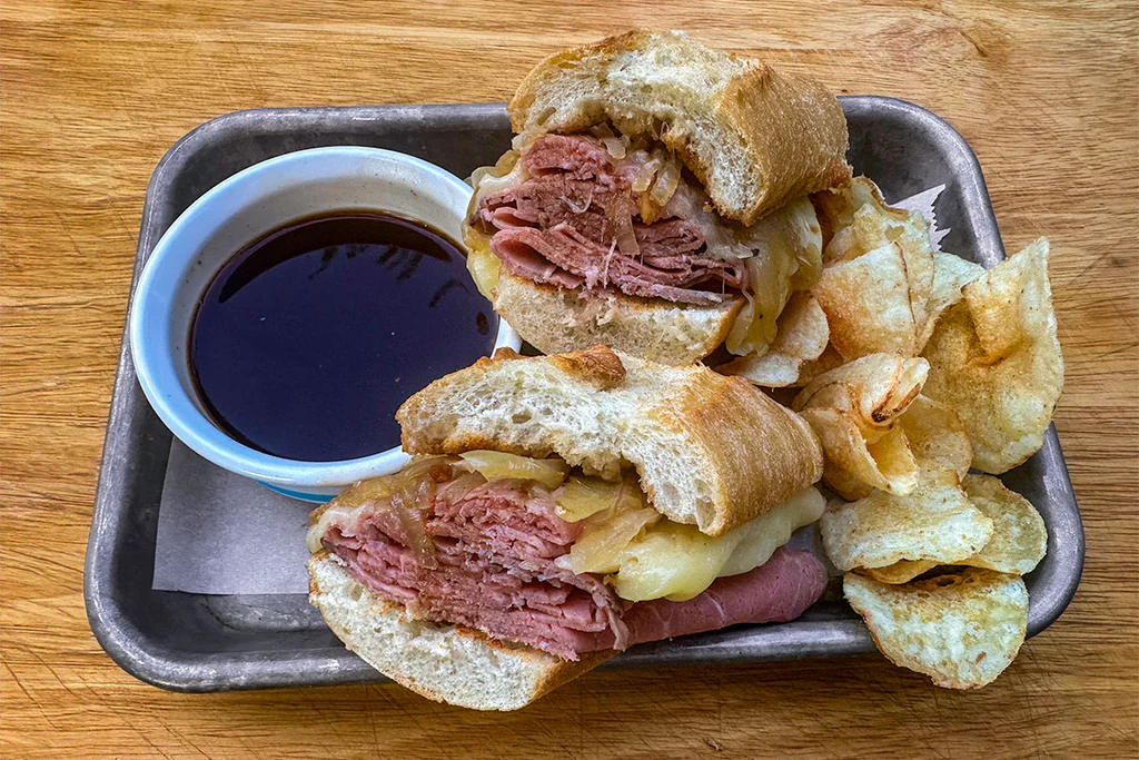 THE BIG DIPPER — Mørbrad · jarlsberg · karamellisert løk · au jus.
